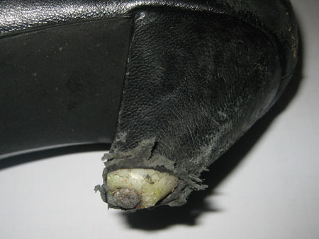 Damaged high heel close up